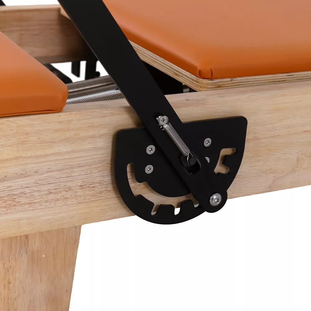 Side footbar adjustment detail of children Pilates reformer Side footbar adjustment detail of children Pilates reformer