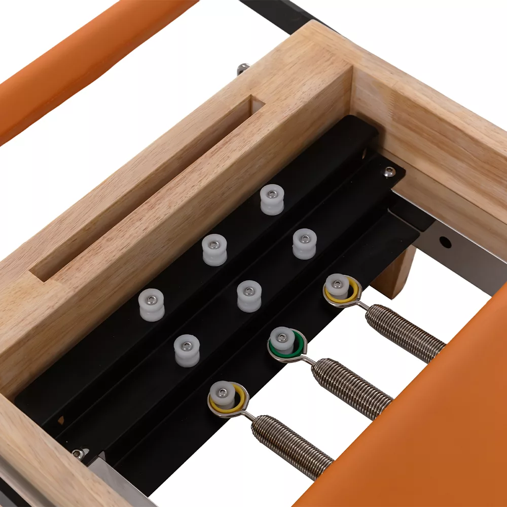 Spring attachment system on wooden children Pilates reformer Spring attachment system on wooden children Pilates reformer